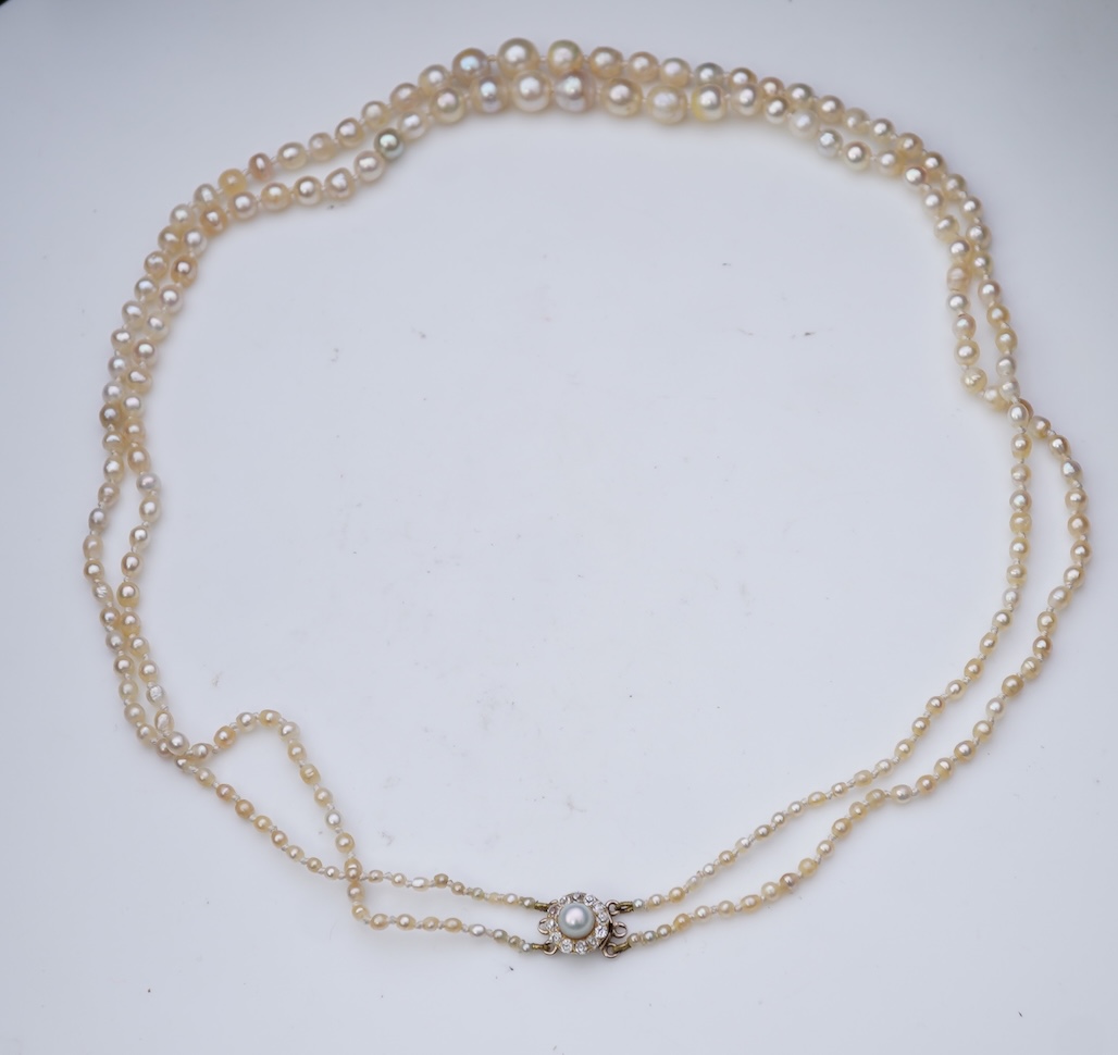 A natural pearl and diamond necklace, early 20th century